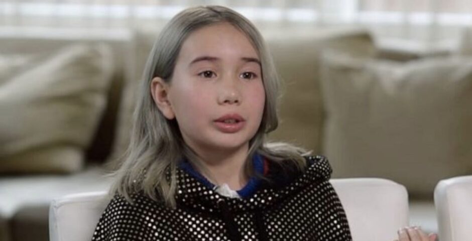 A photo of Lil Tay speaking with a black hoodie on as she is said to be dead