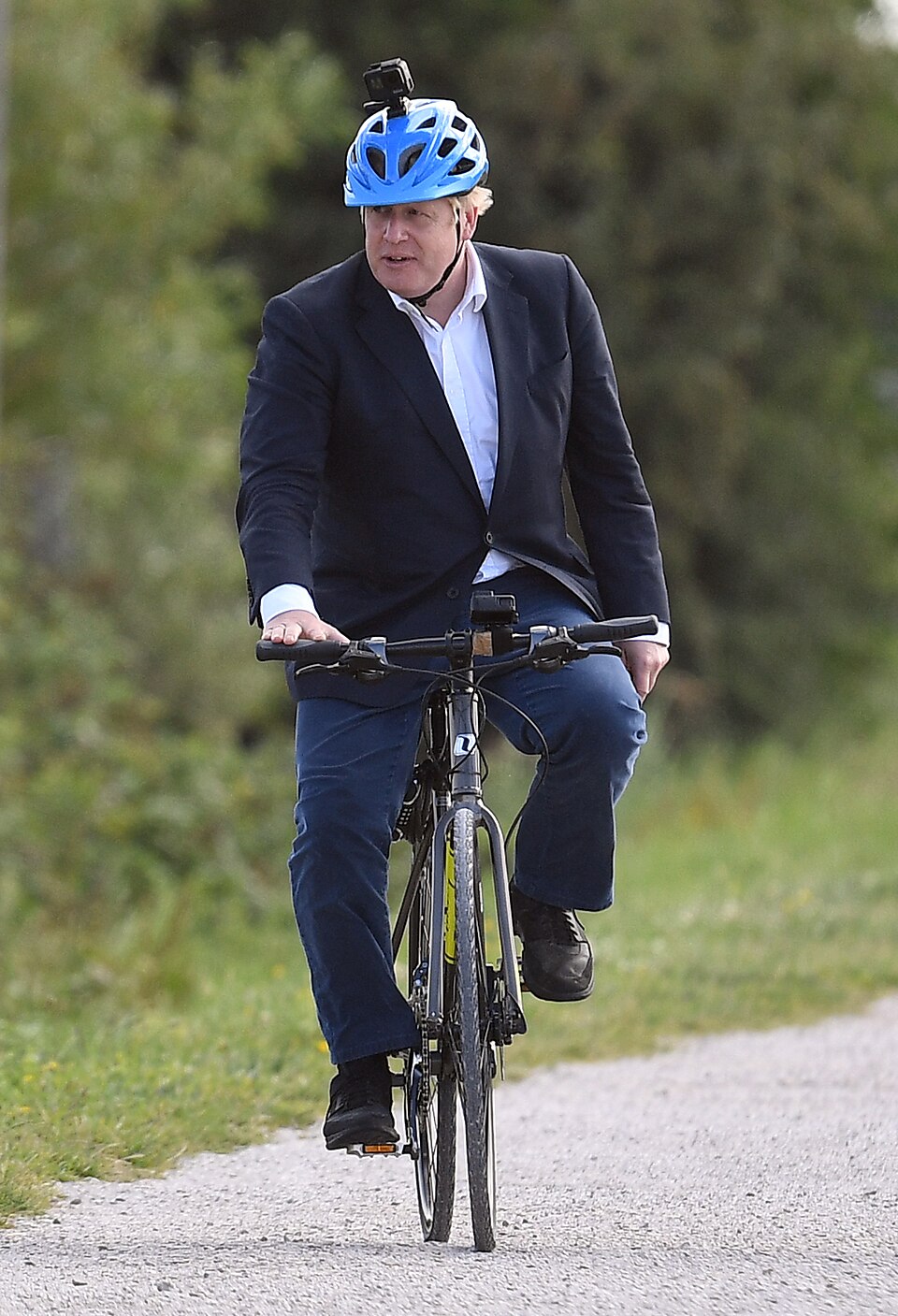 Boris Johnson riding a bike