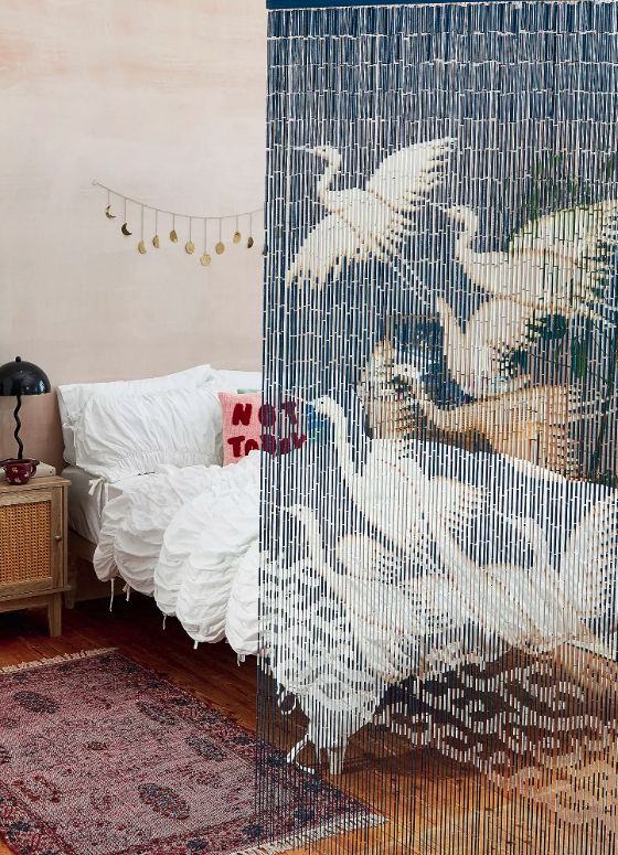 a cranes curtain in a bedroom