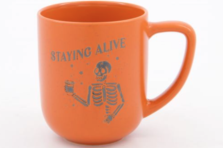 ugly orange skeleton mug
