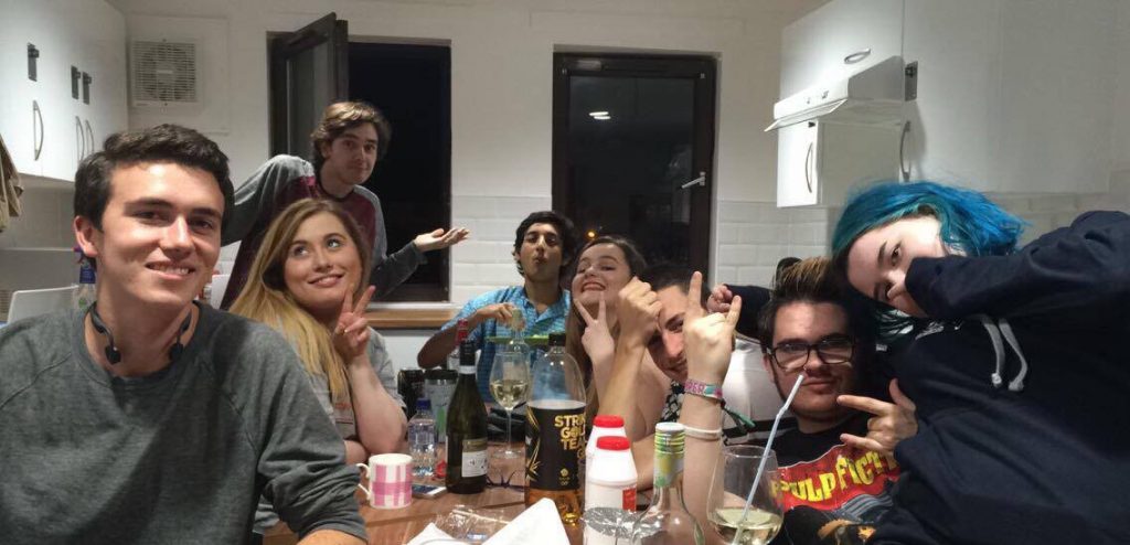 Uni of Glasgow students in their kitchen in Cairncross House student accommodation