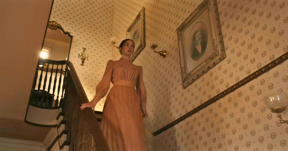 Lizzie Borden halfway down the stairs in Monster(Image via Netflix)