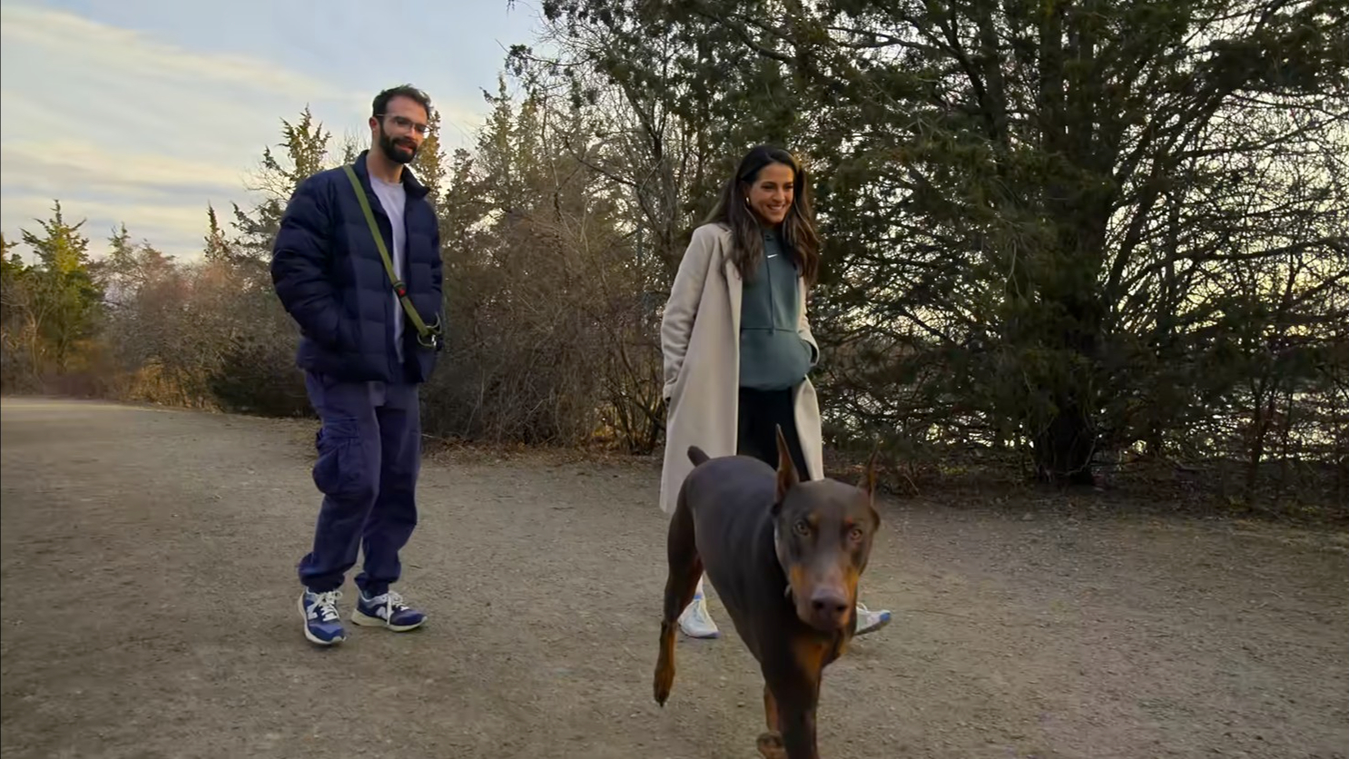 john and sarah and a dog in a park