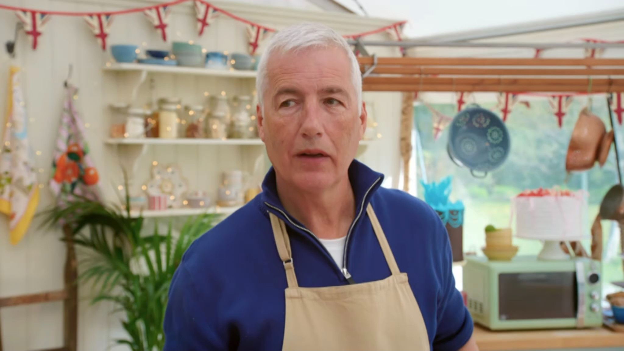 Gary and some very pretty colanders on bake off