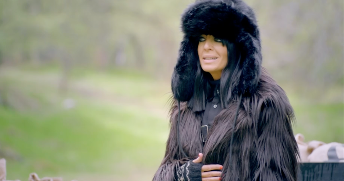 claudia winkleman in a fluffy coat on the celebrity traitors