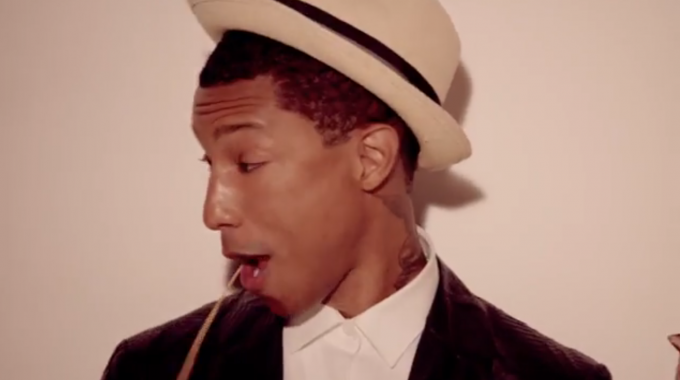 Whatever he's seeing, farmer Pharrell's pretty impressed.