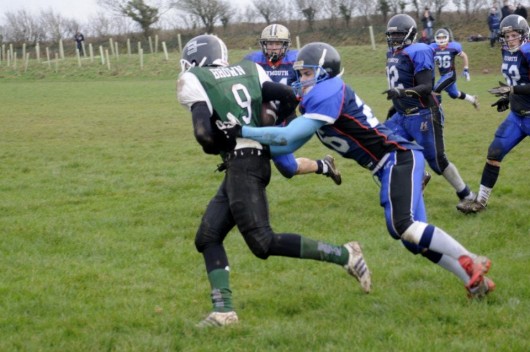 Quarterback Finlay Brown on the run again.