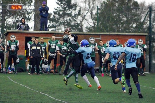 Quarterback Finlay Brown gets the pass off before the sack.