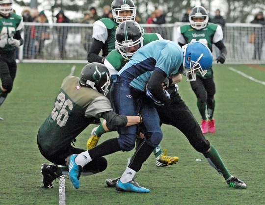 Josh Newton and Kieran Francis link up to stop a Gloucester receiver.