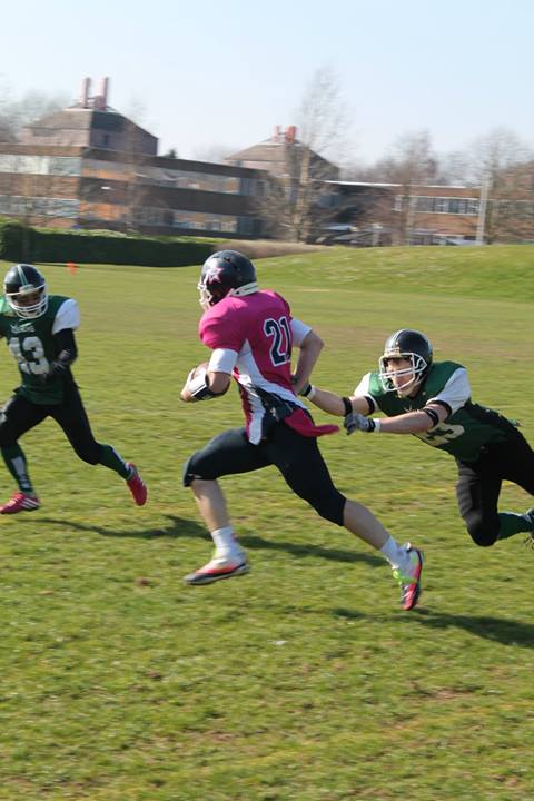 Connor Sealy Grabs Cloth to Make the Tackle
