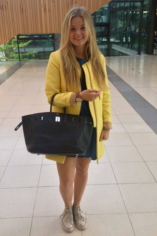 Holly is not afraid of popping color with this bright yellow jacket.