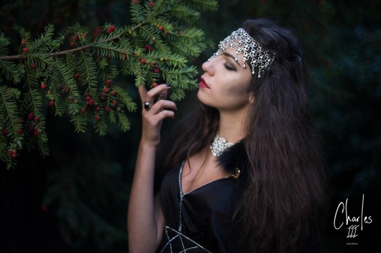 Elizaveta Ivanko is wearing a headpiece (necklace) from Velveteen, dress and cape from the Vintage Store Exeter, necklace is private.