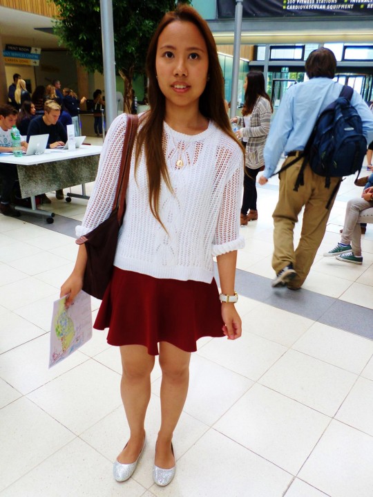 Nattaya looks cute and feminine in this jumper and skirt combo.