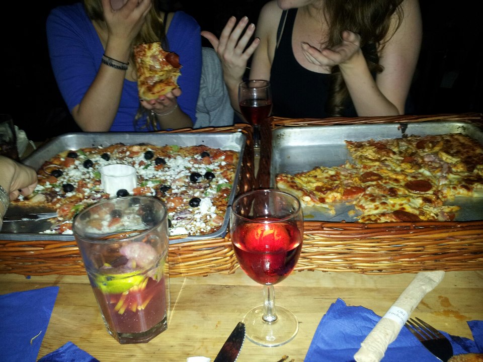 Cheap pizza and cheap wine and sangria. Literally all you need in life.