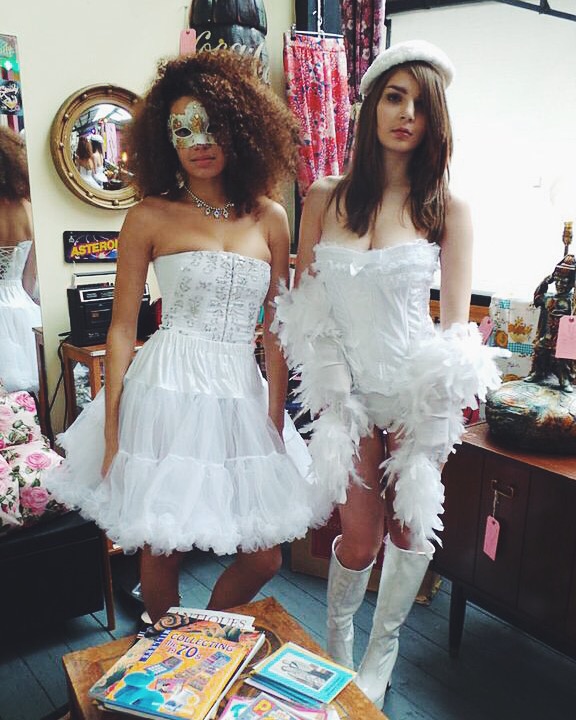 Left: Basque (£8), Lace & Gold Mask (£15), Petticoat (£30 - £13 ones available), Paste Necklace (£22) Right: Basque (£8), Beret (£9), Glittery Gloves (£8), Boa (£12) Boots (£45)
