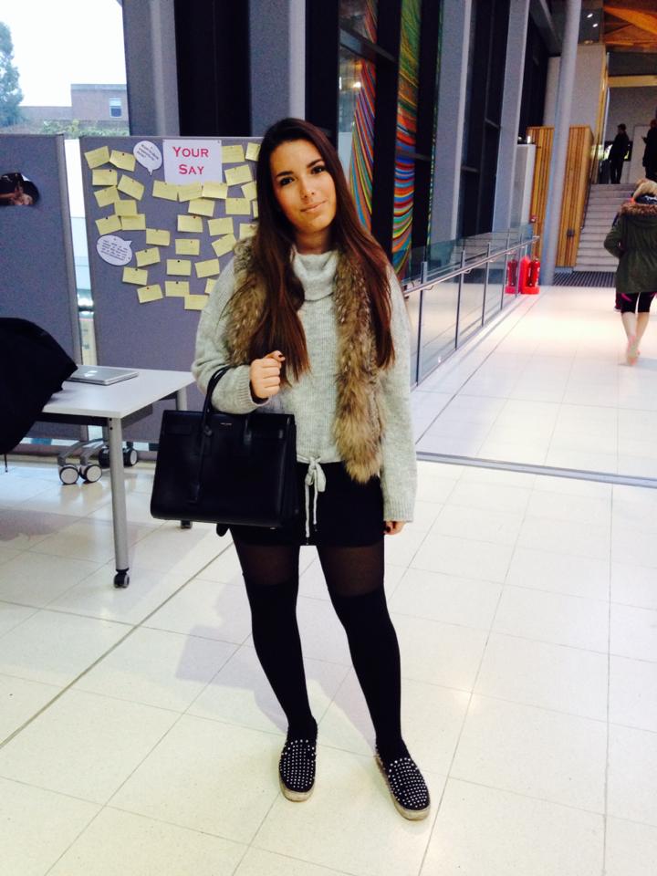 Denise is pulling a very Nordic look with her furry gilet and big warm jumper.