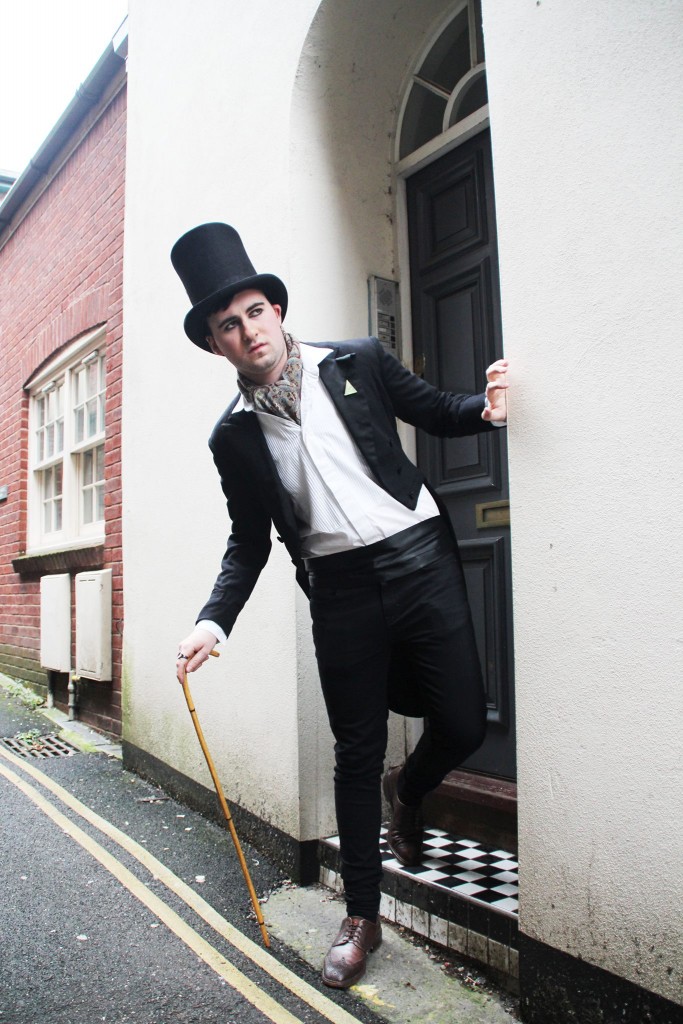 Alex in top hat (£45), belt and tailcoat from Velveteen. Shirt, scarf and brogue shoes from Vintage Store Exeter.