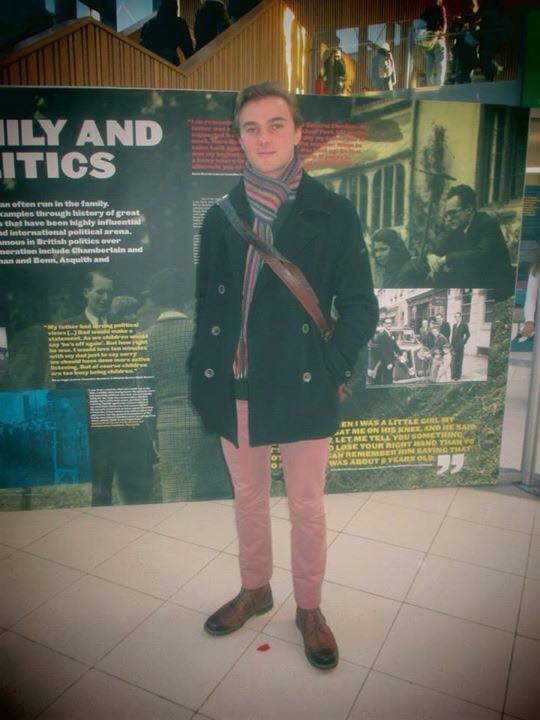 Theo stands out from the crowd in these pastel trousers.