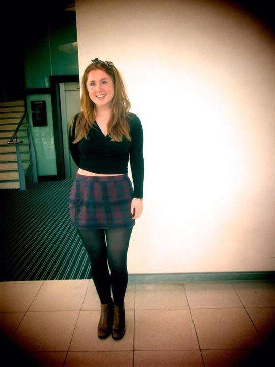 Stephie looks 50s chic with this cute headband and plaid skirt.