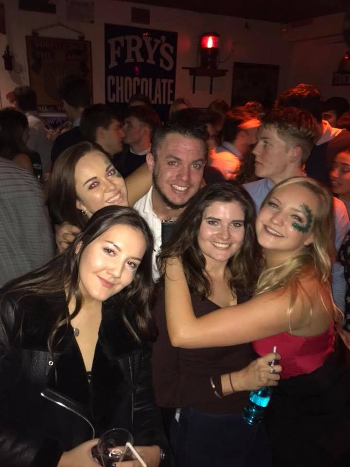 Image may contain: Drink, Beverage, Alcohol, Crowd, Club, Party, Person, People, Human