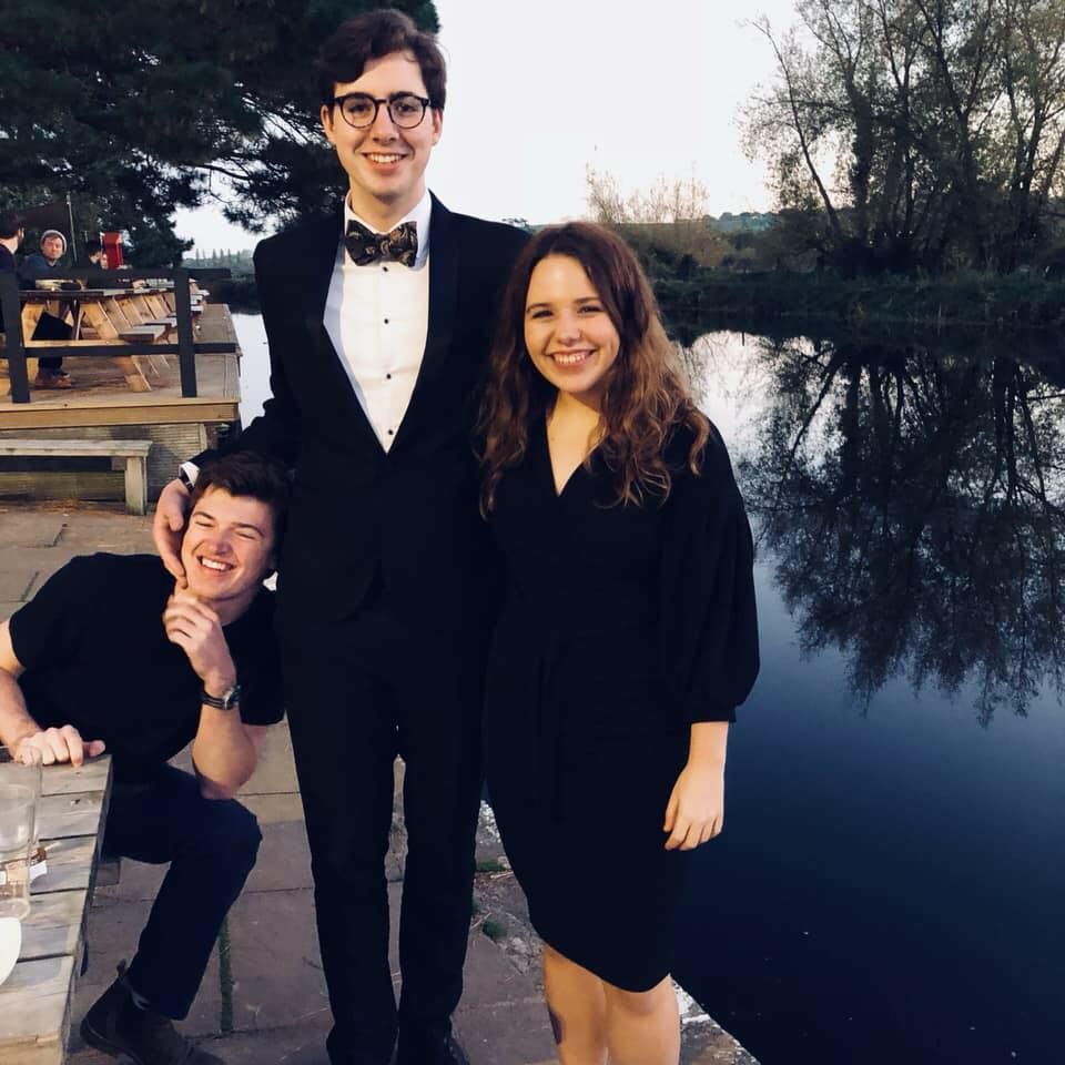Image may contain: Nature, Vegetation, Smile, People, Girl, Tree, Photo, Portrait, Photography, Woman, Plant, Footwear, Shoe, Outdoors, Water, Jacket, Blazer, Female, Face, Tuxedo, Dress, Person, Human, Suit, Coat, Overcoat, Clothing, Apparel