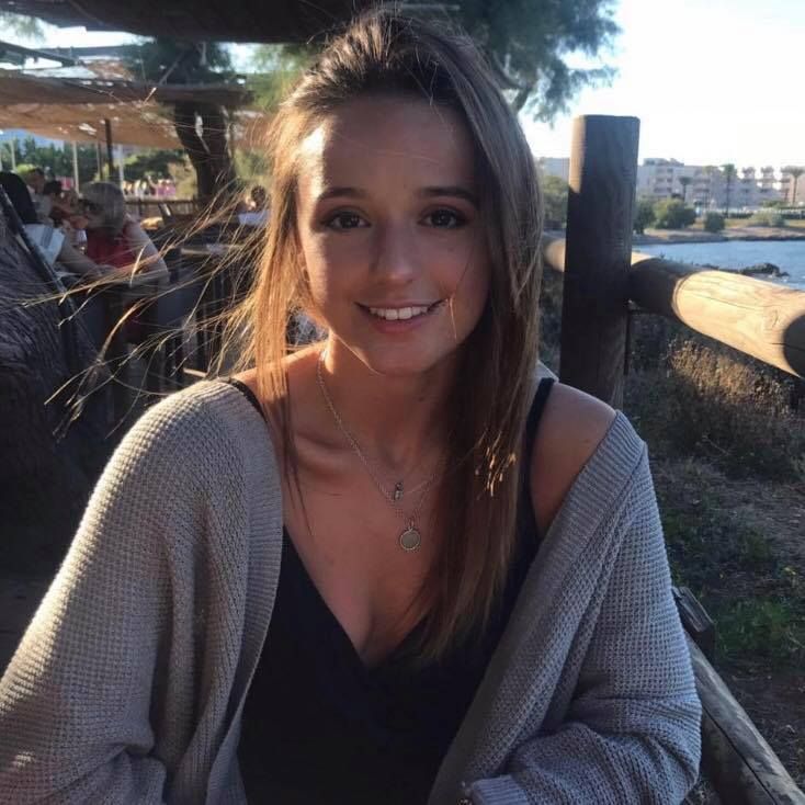 Image may contain: Pier, Port, Dock, Chair, Furniture, Accessories, Jewelry, Necklace, Accessory, Portrait, Photo, Photography, Waterfront, Girl, Smile, Water, Tool, Axe, Nature, Woman, Outdoors, Apparel, Clothing, Female, Face, Human, Person