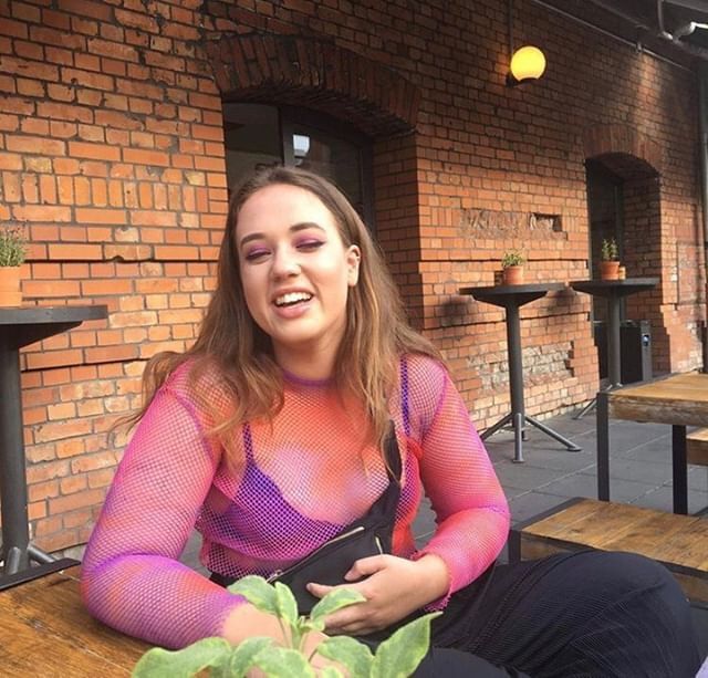 Image may contain: Brick, Girl, Restaurant, Food, Meal, Woman, Clothing, Apparel, Plant, Dining Table, Face, Chair, Female, Table, Tabletop, Furniture, Human, Person