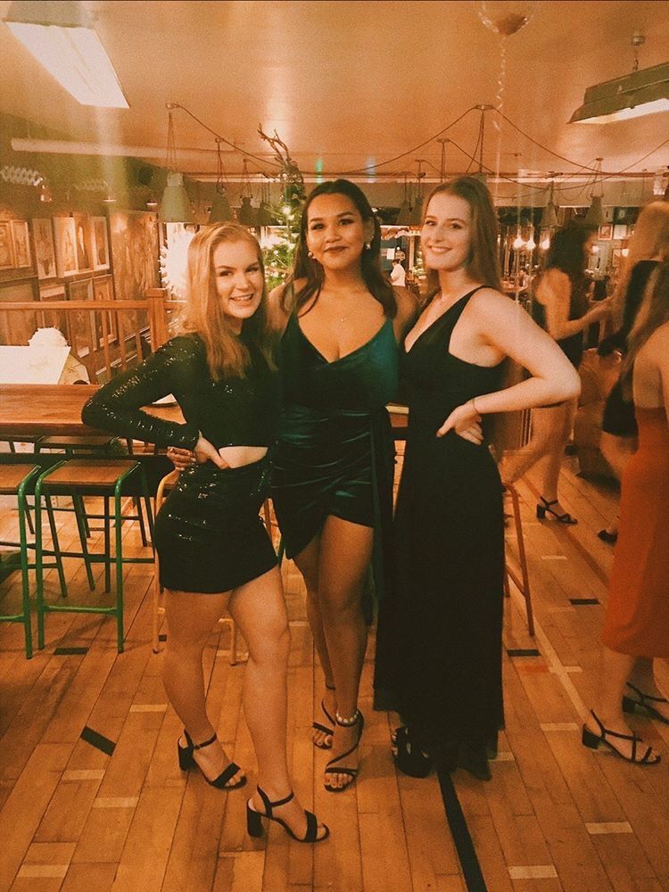 Image may contain: Floor, Bar Counter, Pub, Female, Indoors, Interior Design, Gown, Evening Dress, Robe, Fashion, Plywood, Flooring, Hardwood, Apparel, Clothing, Wood, Person, Human