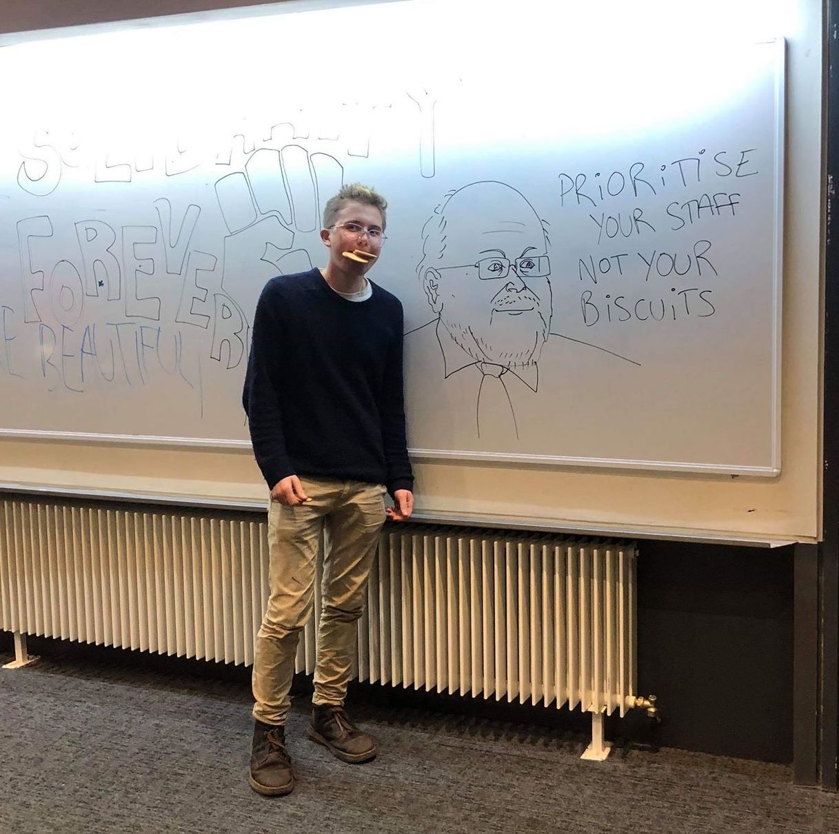 Image may contain: White Board, Person, Human