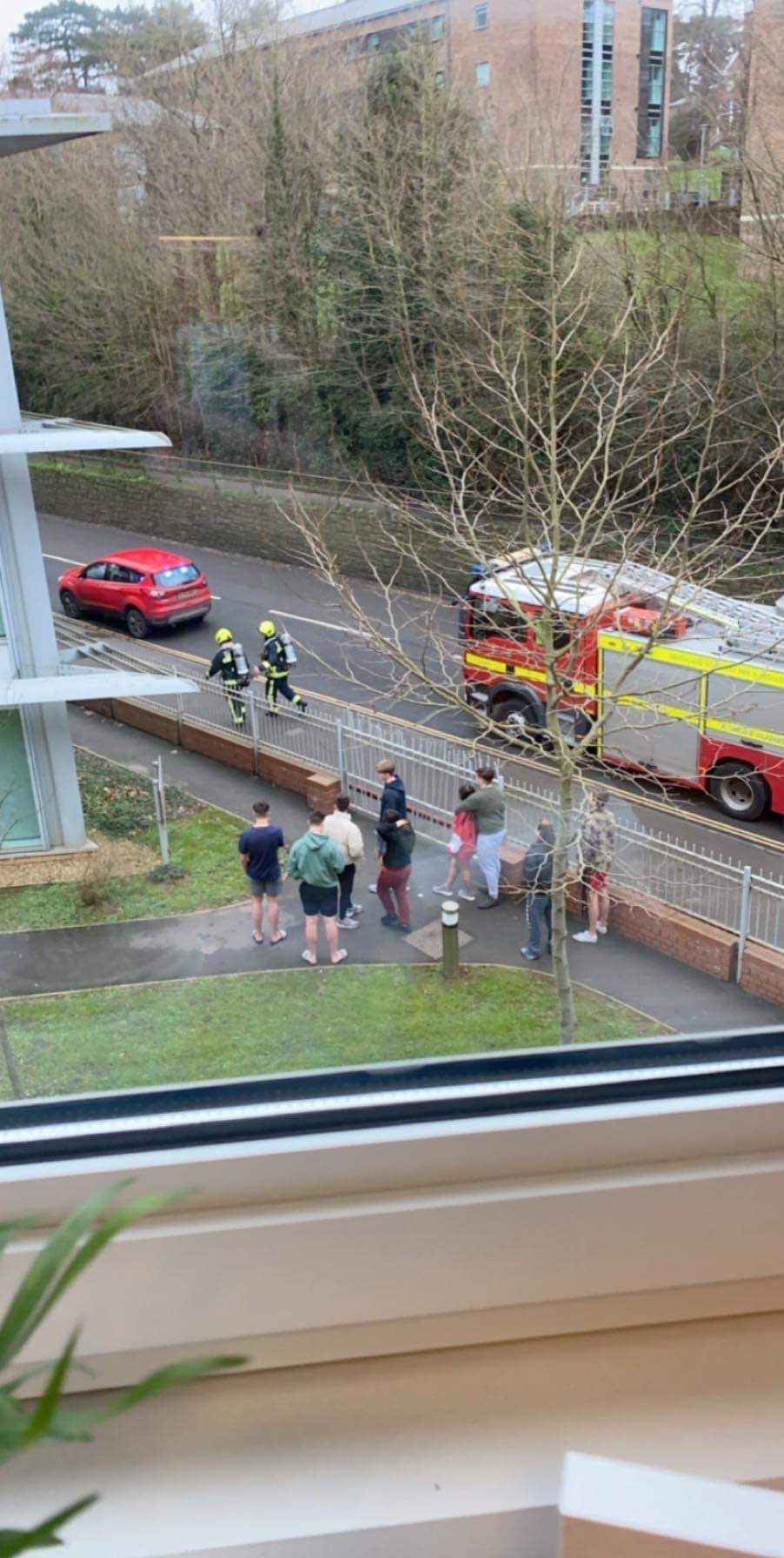 Image may contain: Road, Fire Truck, Truck, Transportation, Vehicle, Car, Automobile, Person, Human