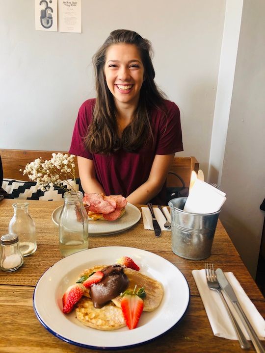 Image may contain: People, Female, Glass, Dating, Tabletop, Home Decor, Food, Meal, Dish, Dining Table, Table, Furniture, Person, Human