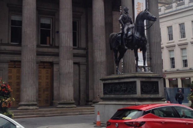 The statue isn't the same without its cone