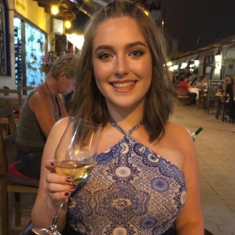 Image may contain: Restaurant, Cafe, Smile, Portrait, Face, Pub, Person, People, Human