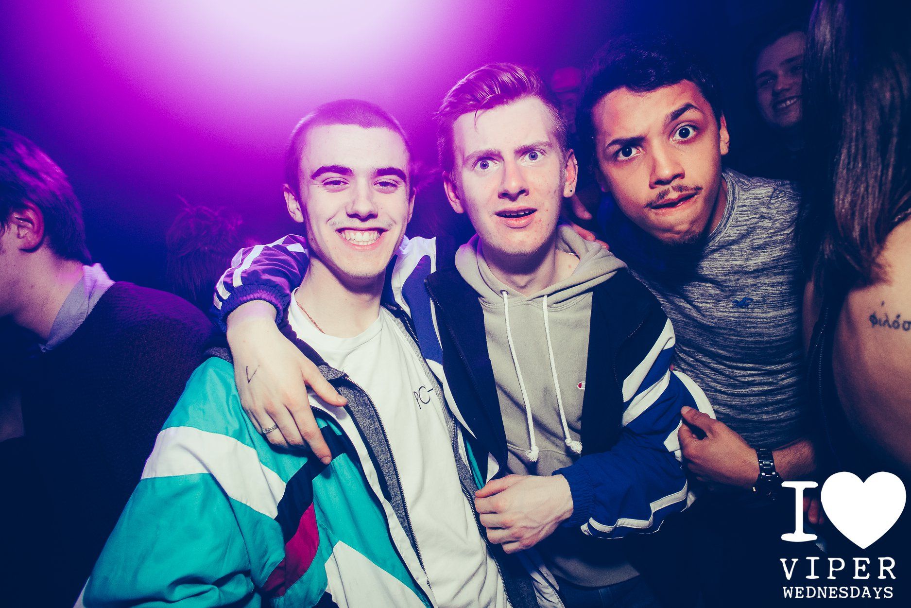 Image may contain: Smile, Portrait, Face, Light, Glitter, Night Life, Night Club, Club, Person, People, Human