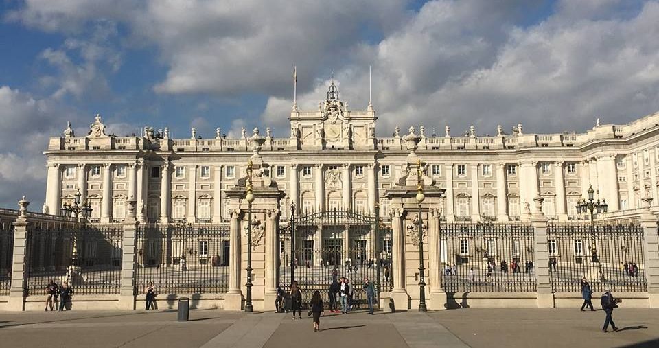 Image may contain: Person, Pedestrian, Human, Palace, Mansion, Housing, House, Castle, Urban, Town Square, Town, Plaza, Downtown, City, Building, Architecture