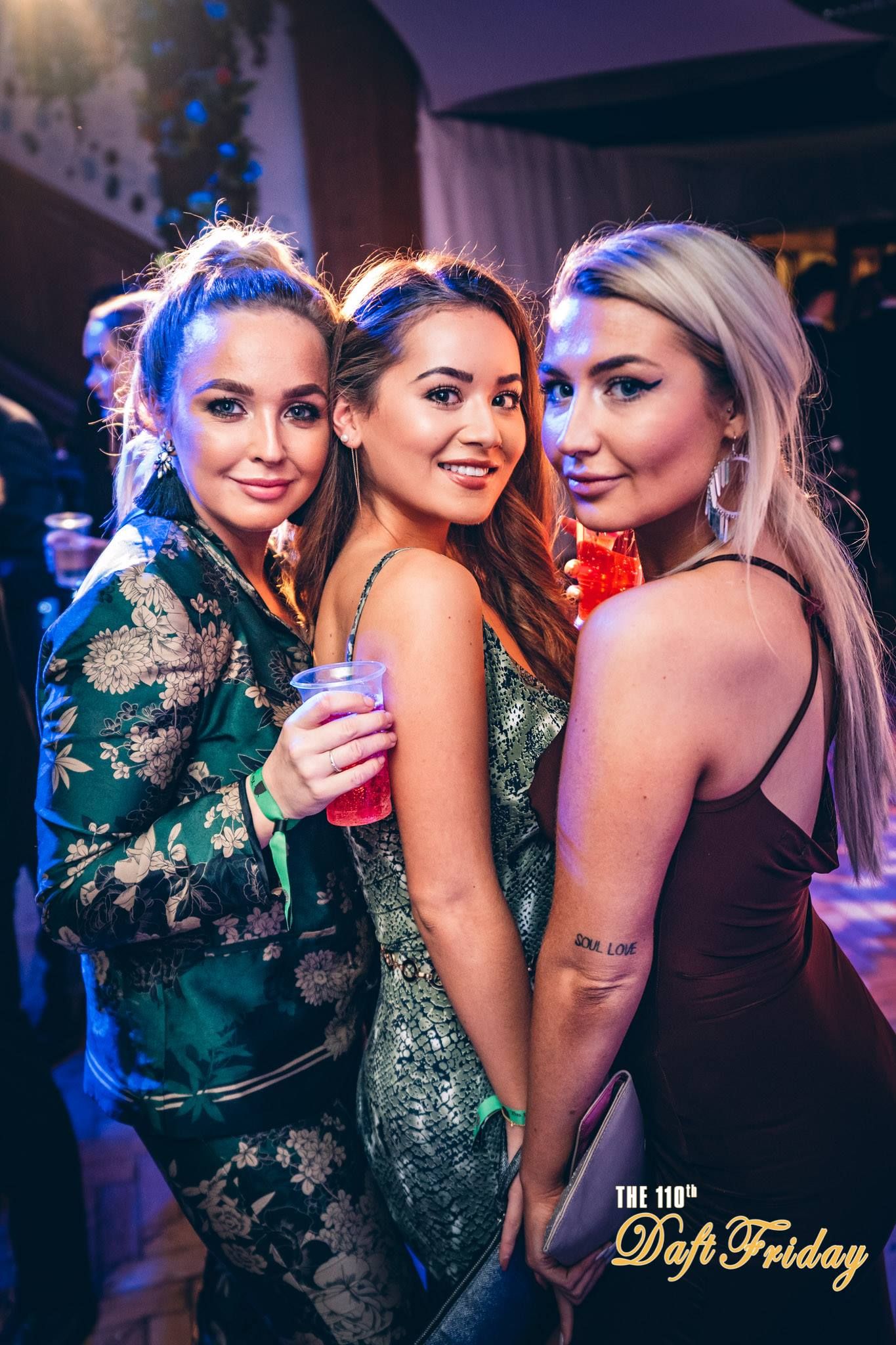 Image may contain: Apparel, Gown, Fashion, Robe, Clothing, Evening Dress, Night Life, Party, Night Club, Club, Human, Person