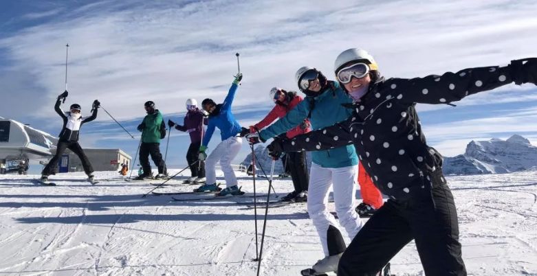 Image may contain: Mountain Range, Peak, Mountain, Helmet, Piste, Apparel, Clothing, Snow, Skiing, Sport, Sports, Outdoors, Human, Person, Nature