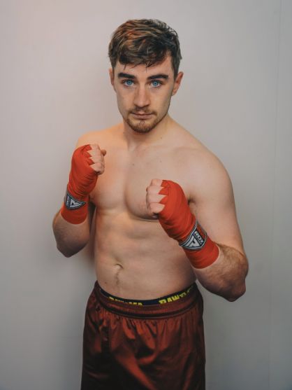 Image may contain: Boxing, Skin, Sport, Sports, Man, Arm, Human, Person