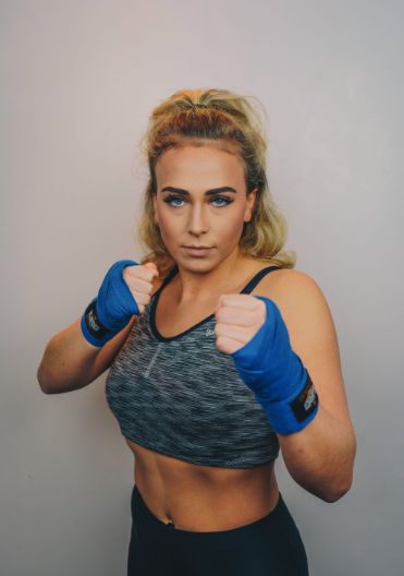 Image may contain: Fitness, Boxing, Exercise, Working Out, Apparel, Clothing, Woman, Sports, Sport, Female, Human, Person, Arm
