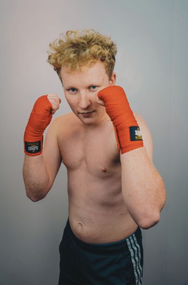 Image may contain: Hand, Sport, Boxing, Sports, Human, Person, Arm