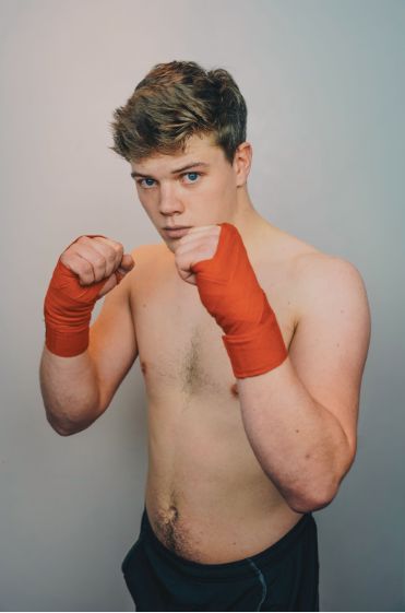 Image may contain: Sport, Sports, Boxing, Human, Person, Arm