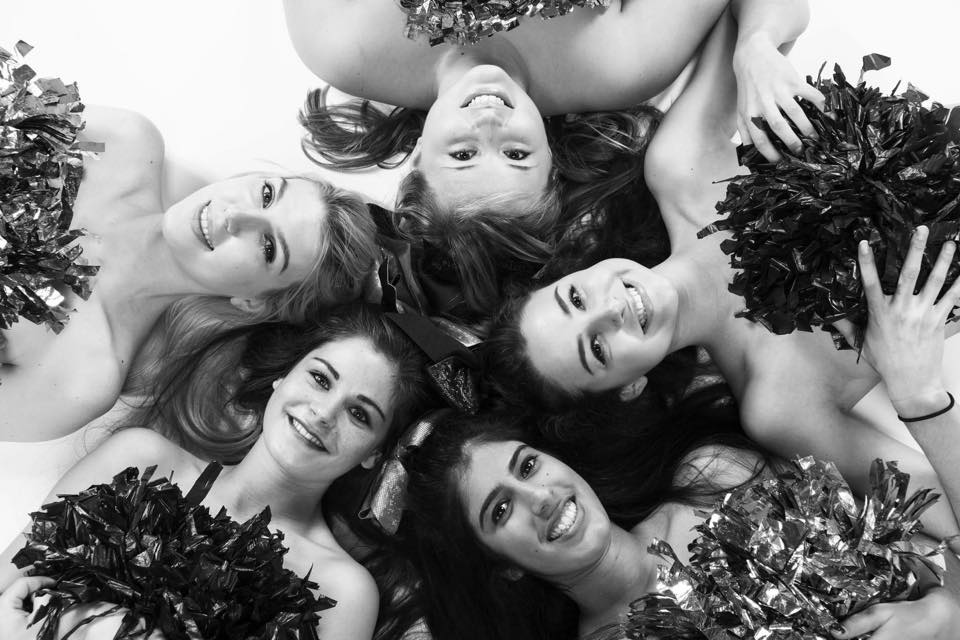 Strategically placed pom-poms at the ready.