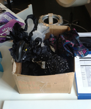 You can stand under my umbrella ... Box of brollies is a godsend for students who are victims of the heavens above