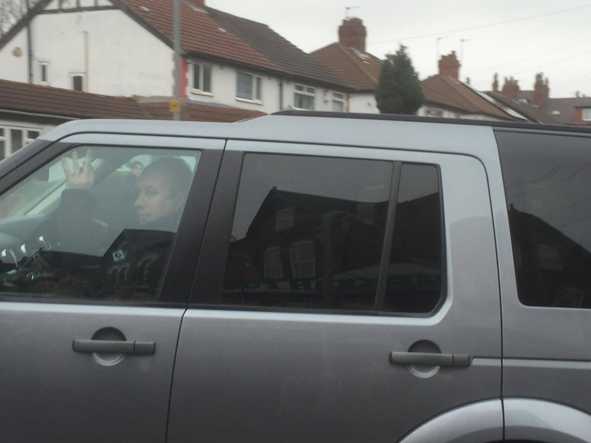 The PM's blacked-out car leaving the mosque