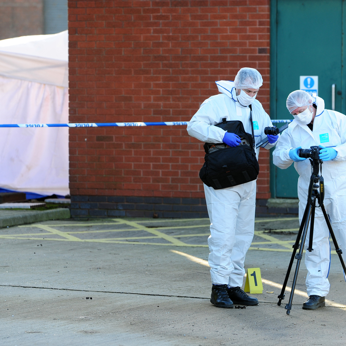 Forensic investigators at the crime scene