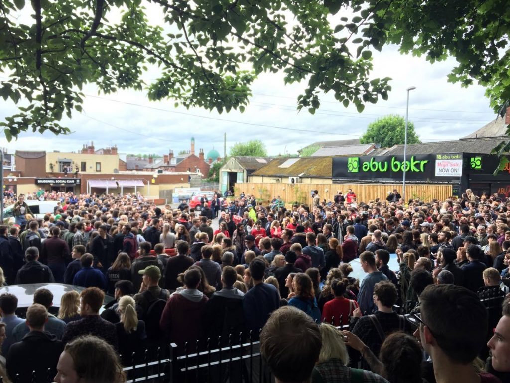 A crowd waits for the arrival of jeremy corbyn hyde park