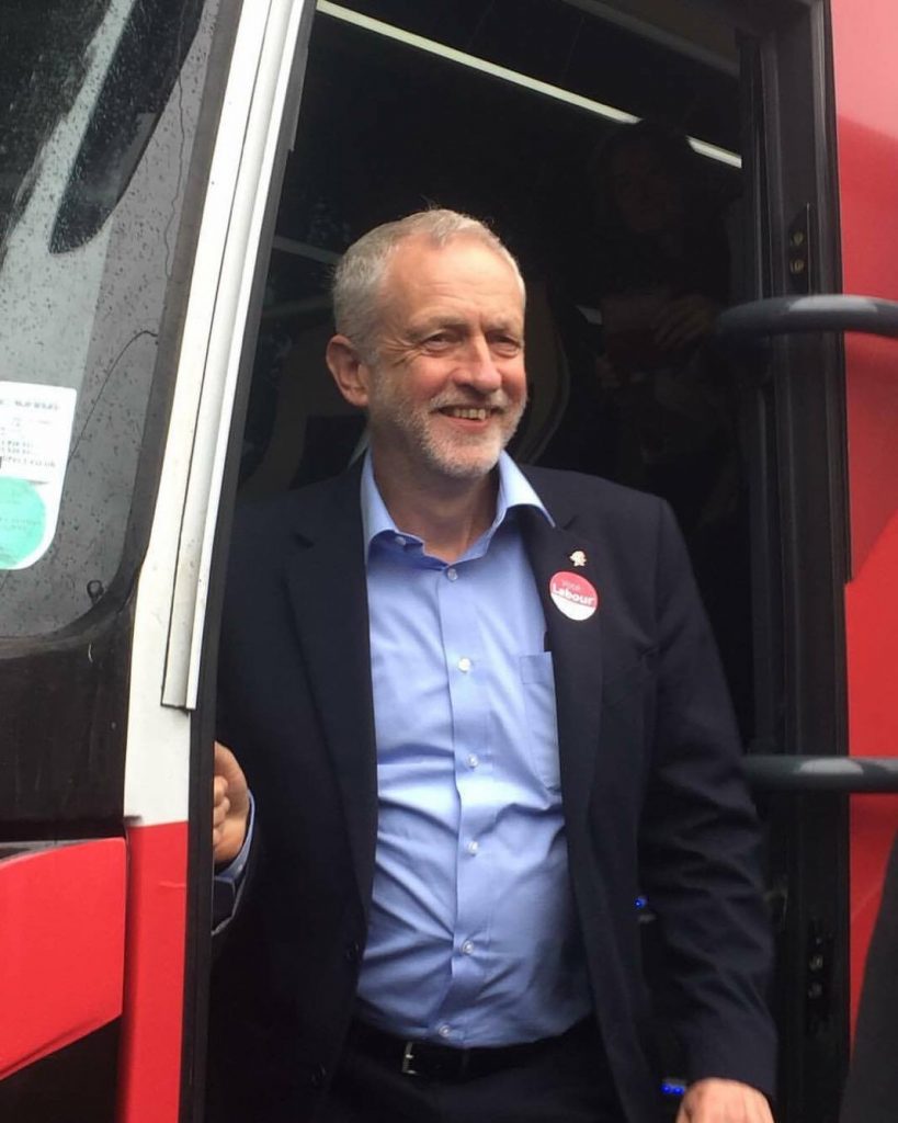 Jeremy Corbyn steps off his campaign bus in Leeds