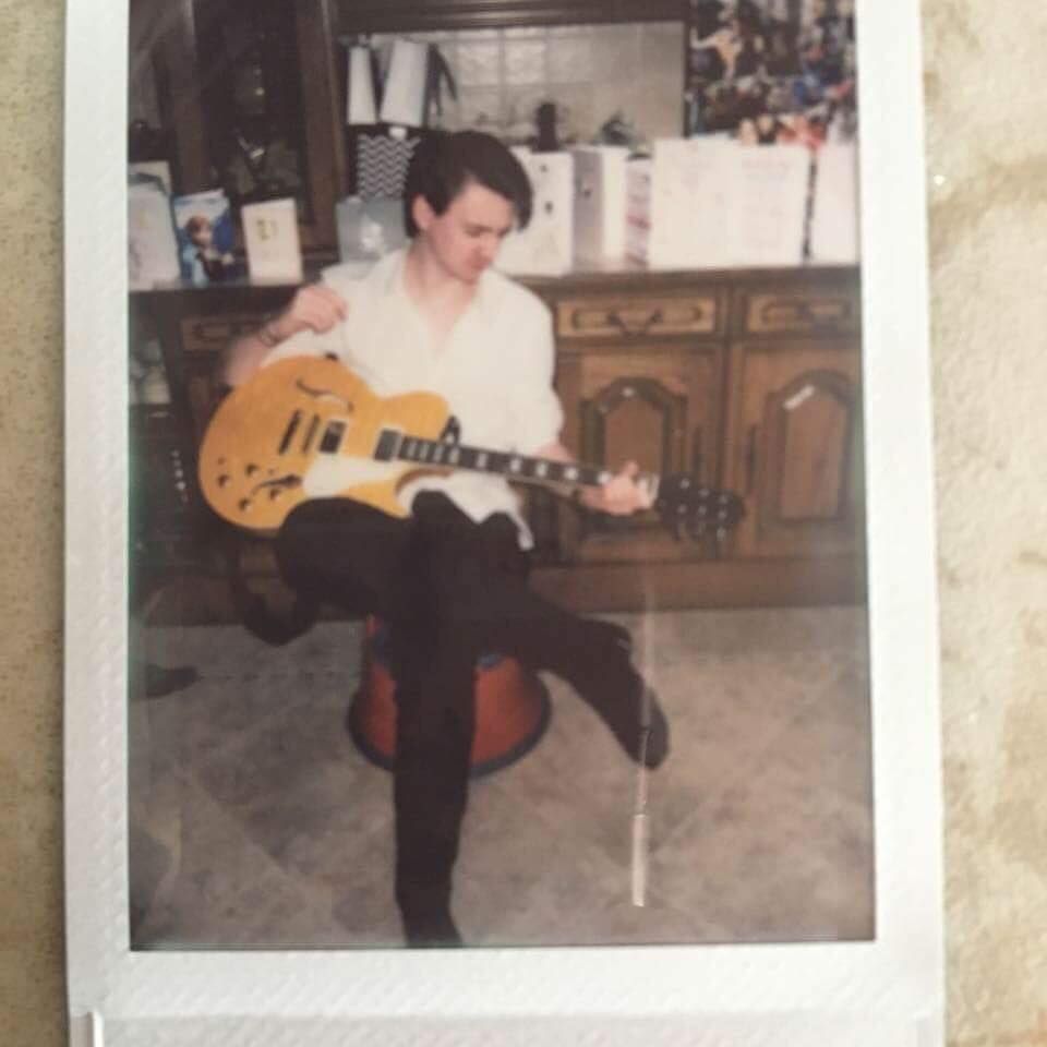 Image may contain: Electric Guitar, Performer, Musician, Musical Instrument, Music, Leisure Activities, Guitarist, Guitar, Person, People, Human