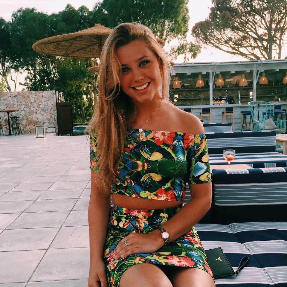 Image may contain: Furniture, Chair, Vase, Pottery, Potted Plant, Plant, Jar, Flora, Swimwear, Maillot, Clothing, Person, People, Human