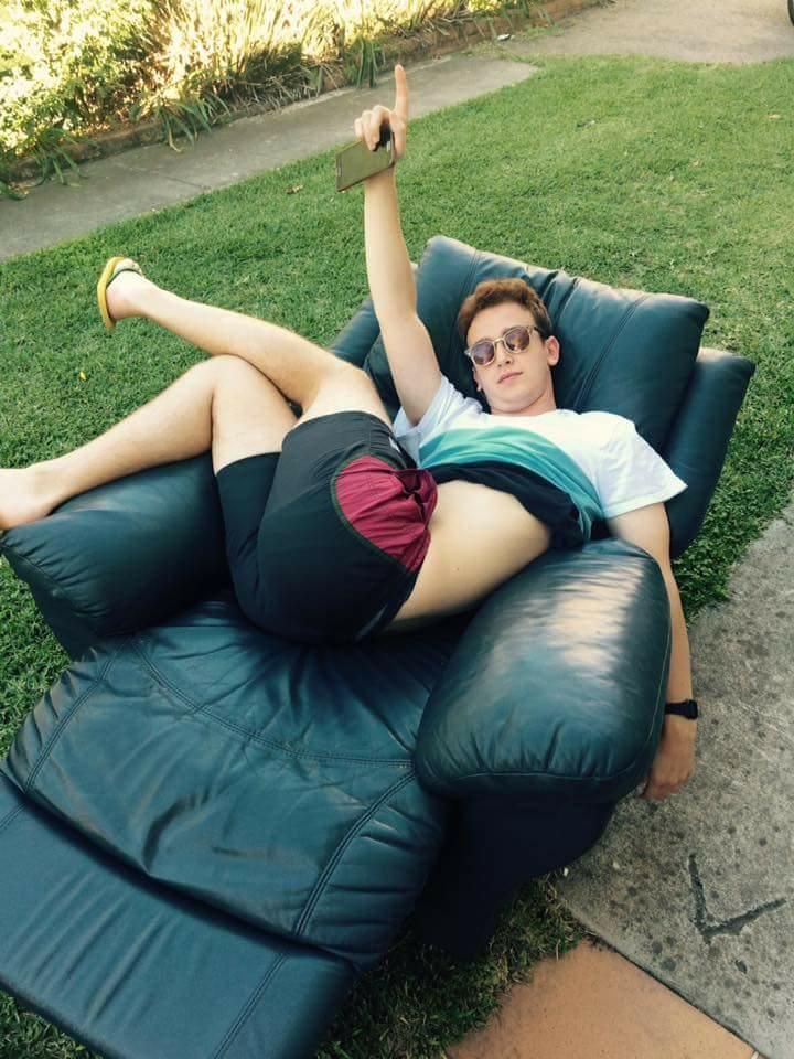 Image may contain: Furniture, Couch, Person, People, Human